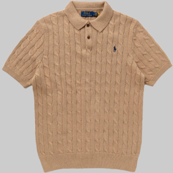 Full view of male model wearing Ralph Lauren beige cable knit polo shirt with signature embroidered logo
