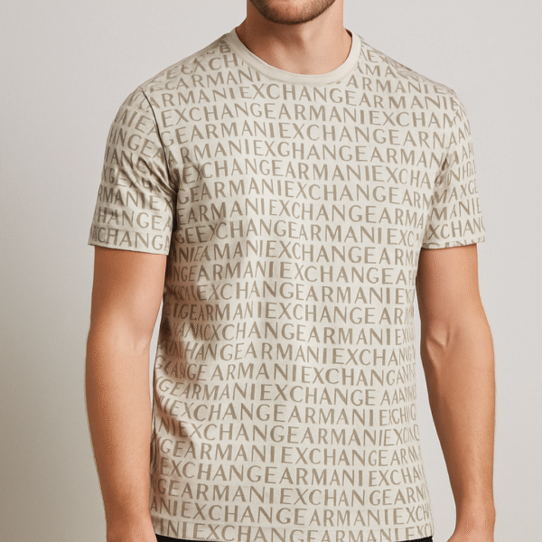 Close-up of Armani Exchange beige T-shirt showing all-over logo print and embroidered branding detail